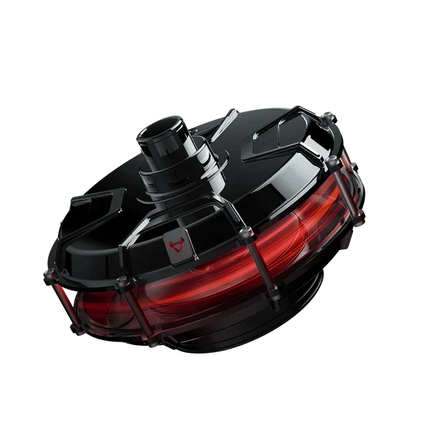 Black and red cylindrical motor component with a central shaft and supported by metal rods.