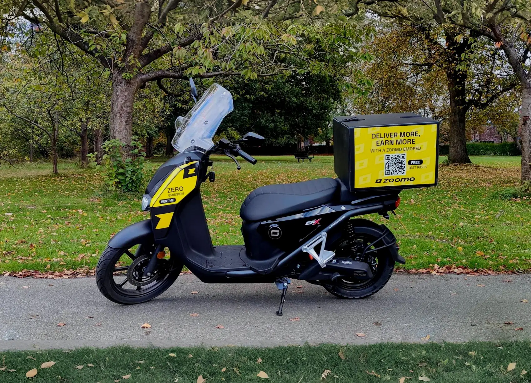 Zoomo e-moped in a park